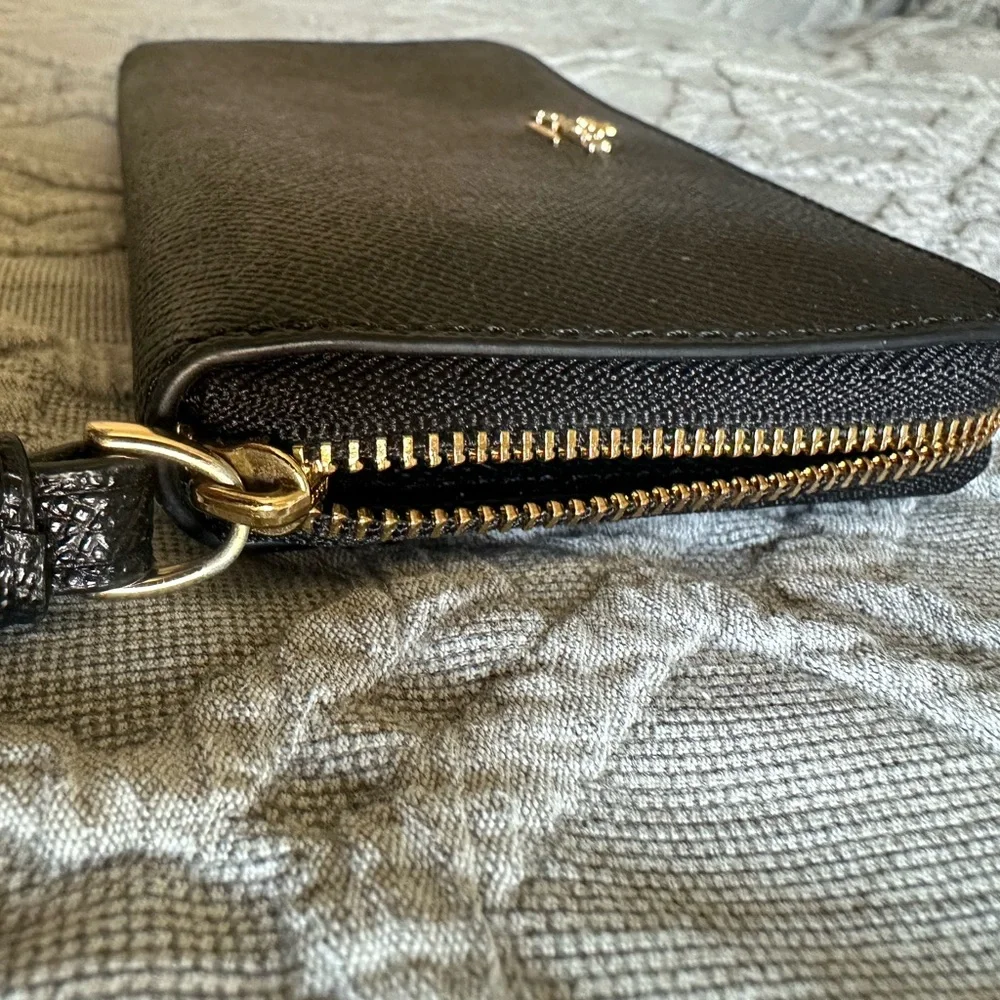 Coach wristlet zip around black pebble wallet